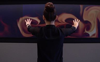 A man with his hands up.