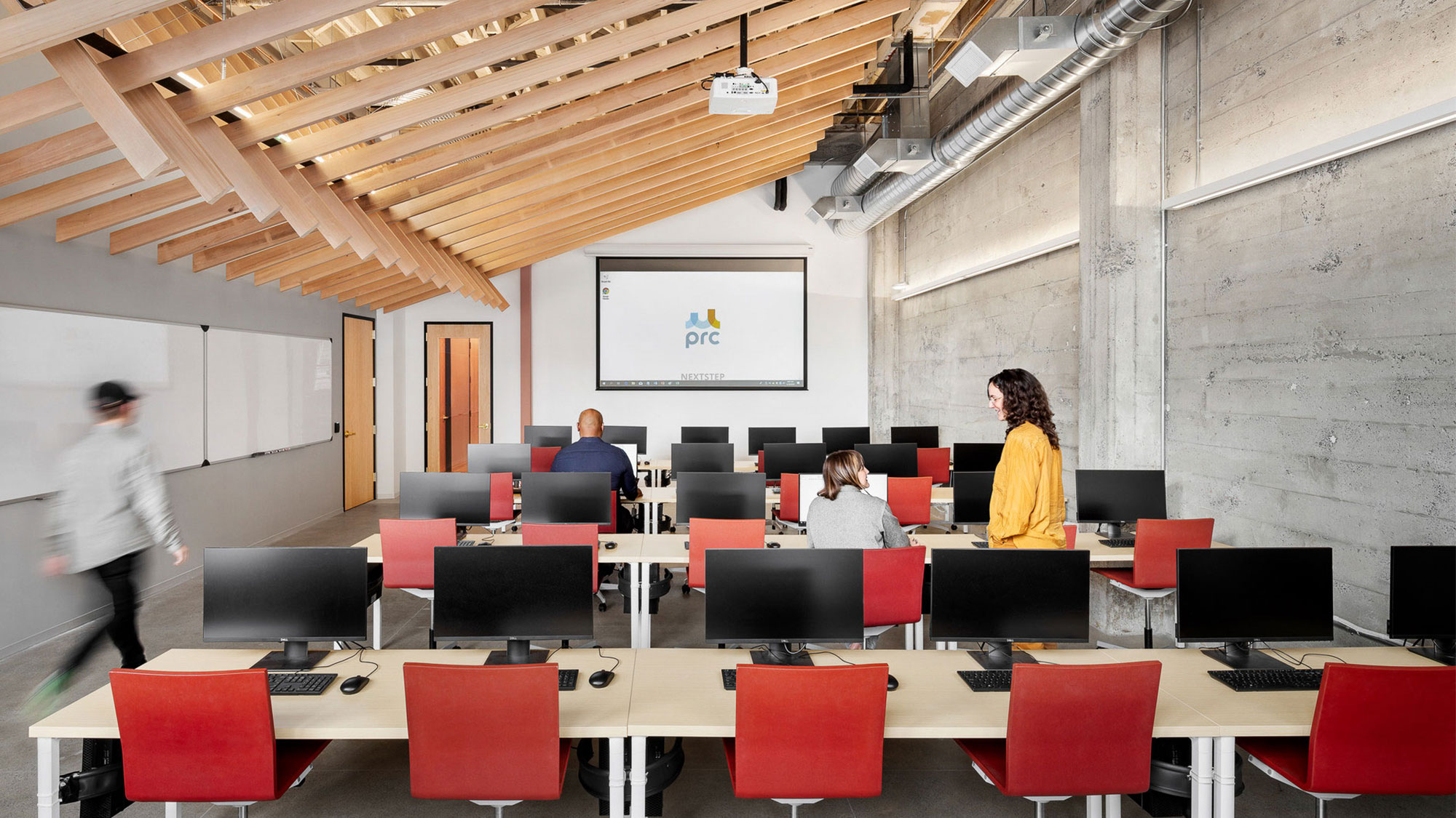 A group of people in a room.