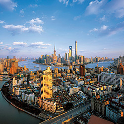 A city with a river and a bridge.