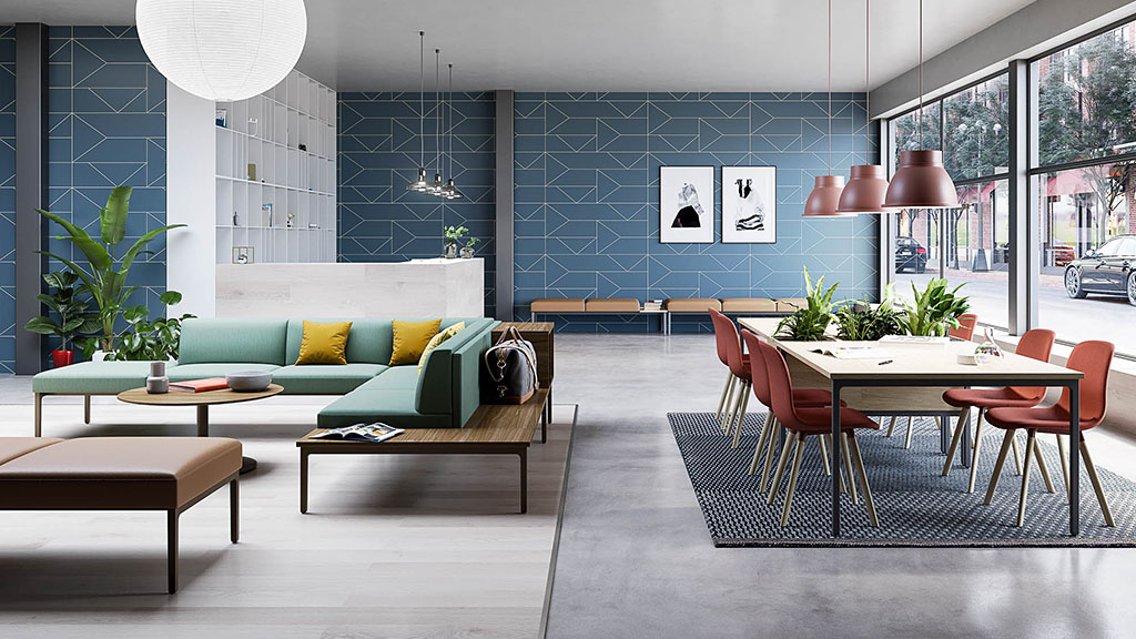 A room with a couch and chairs.