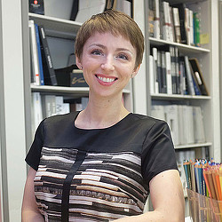A person smiling for the camera.