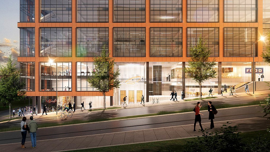 A building with people walking around.