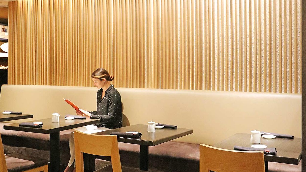 A person sitting at a table.