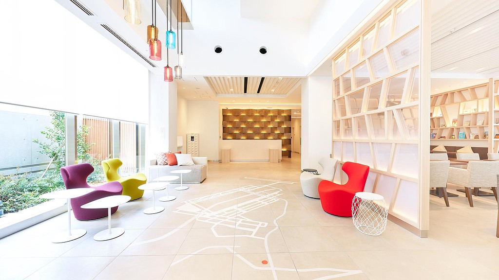 A room with a white floor and a white wall with a white floor.
