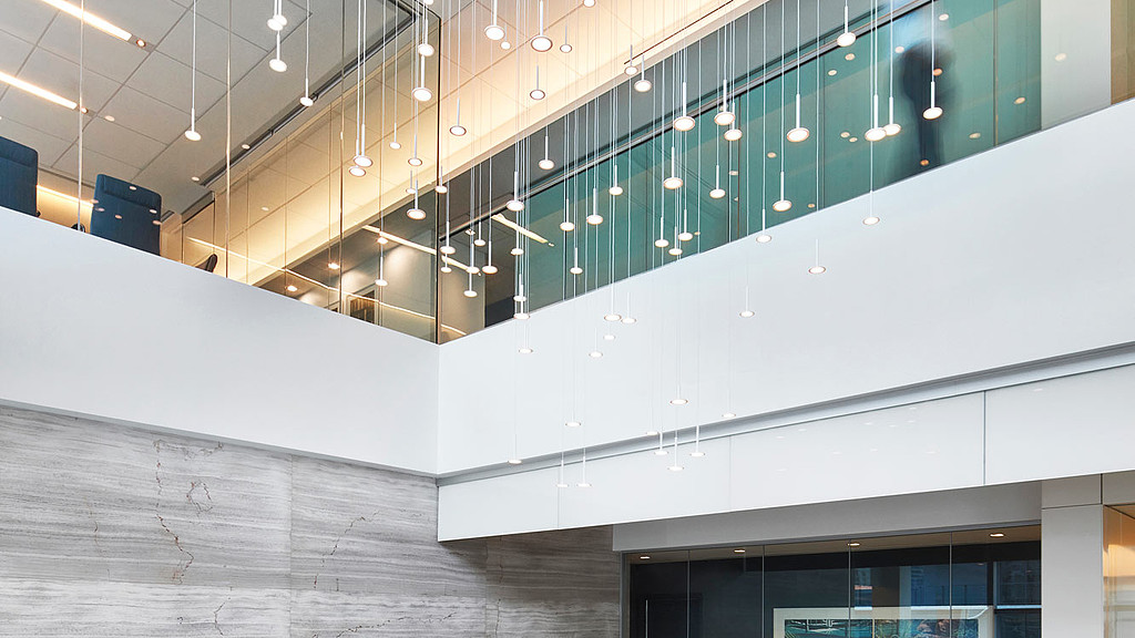A white wall with lights.