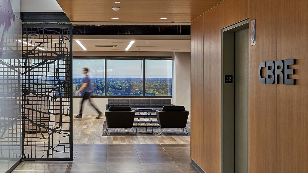 A person walking in a room.