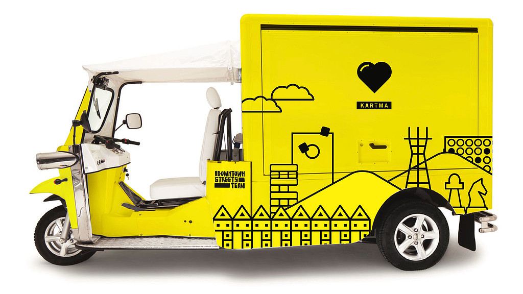 A yellow forklift with a black handle.