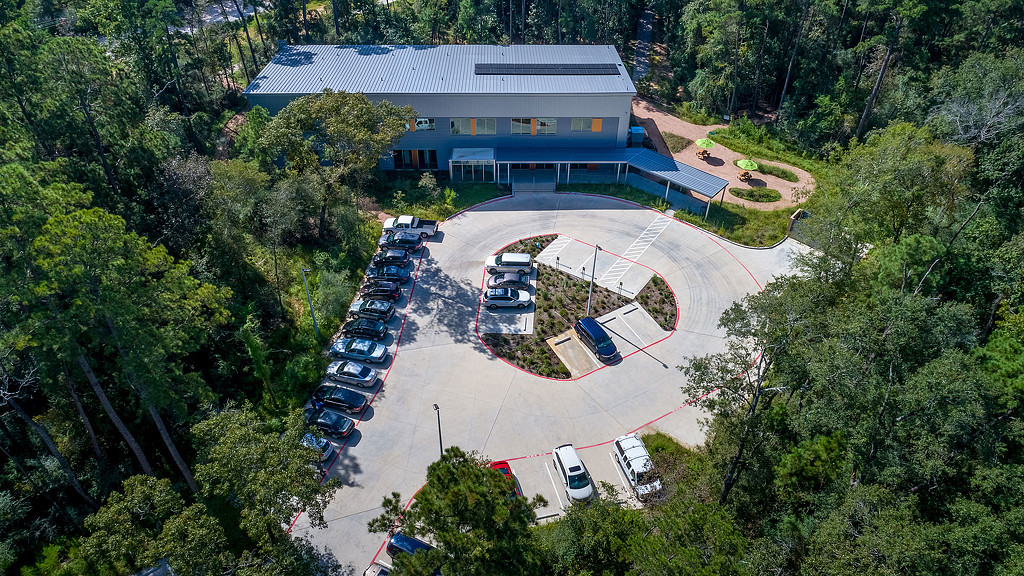 A building with a parking lot.