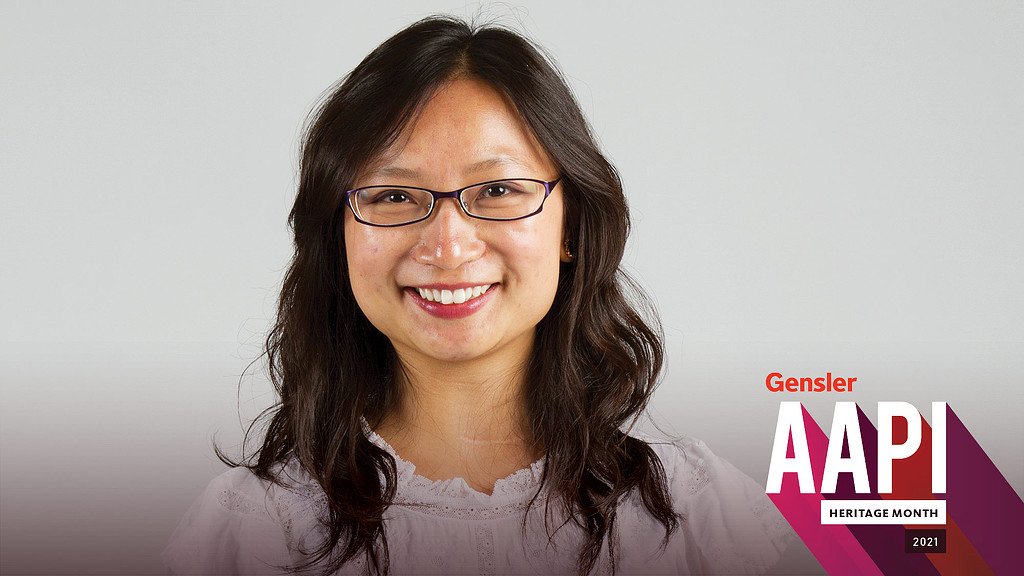 A woman wearing glasses.