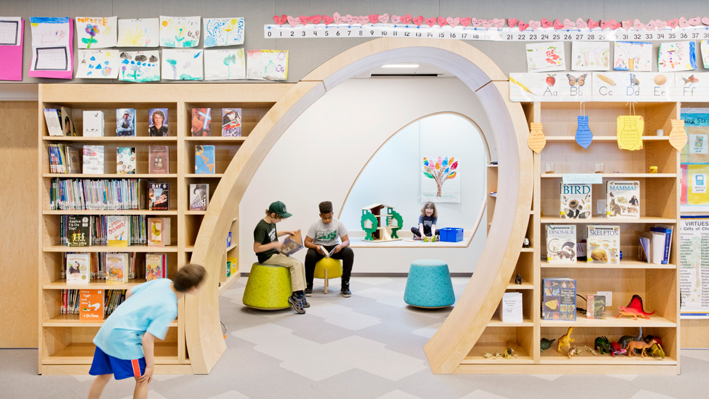 A group of people in a library.