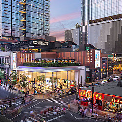 A city street with tall buildings.