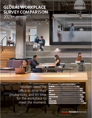 A group of people sitting at a table in a building.