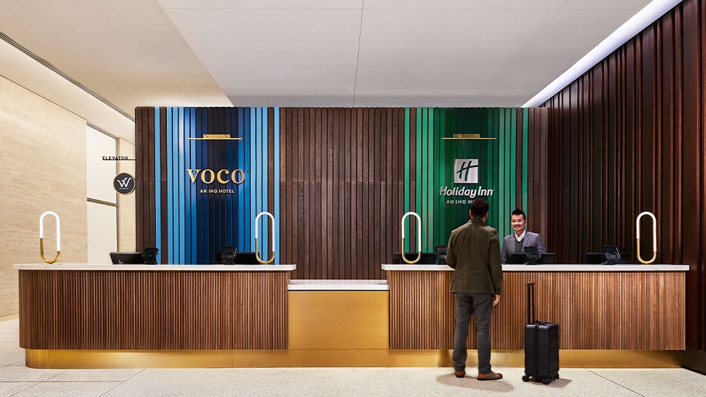 The reception area at voco Holiday Inn Dual Brand with modern design finishes