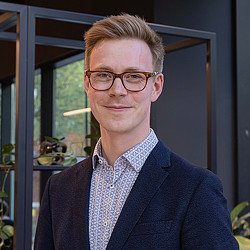 A man wearing glasses.